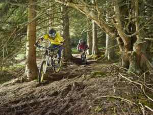 Austria, Tyrol, male and female downhill mountain biker