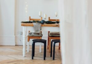 Festive table, minimalistic Christmas decor. Scandinavian interior